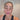 Woman using Glowhaus Sculpt Bar cucumber  – ice facial tool