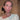 Woman using Glowhaus Sculpt Bar on jawline – ice facial tool